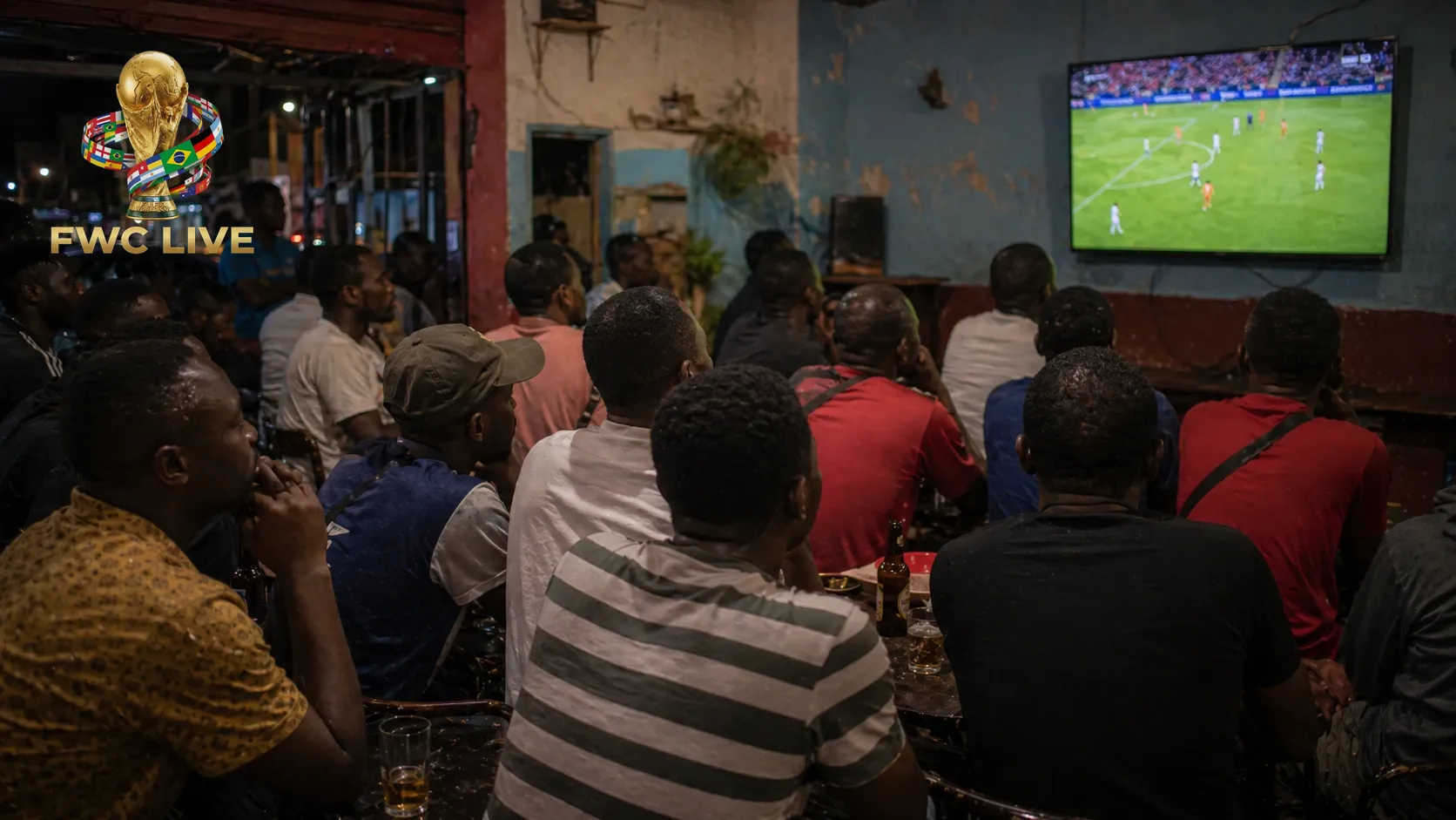 Mozambique football fans watching FIFA World Cup 2026 coverage in a Maputo cafe