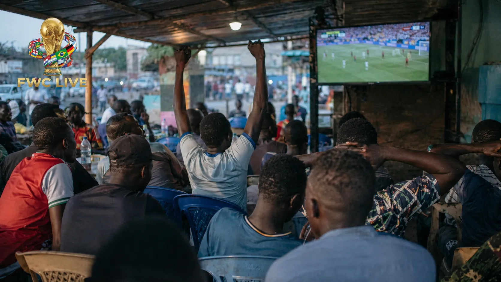 South Sudan football fans watching FIFA World Cup 2026 coverage in a Juba roadside cafe